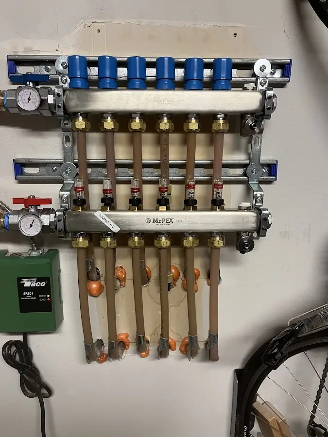 Plumber performing Gas Leak Detection at a residential property in Groton